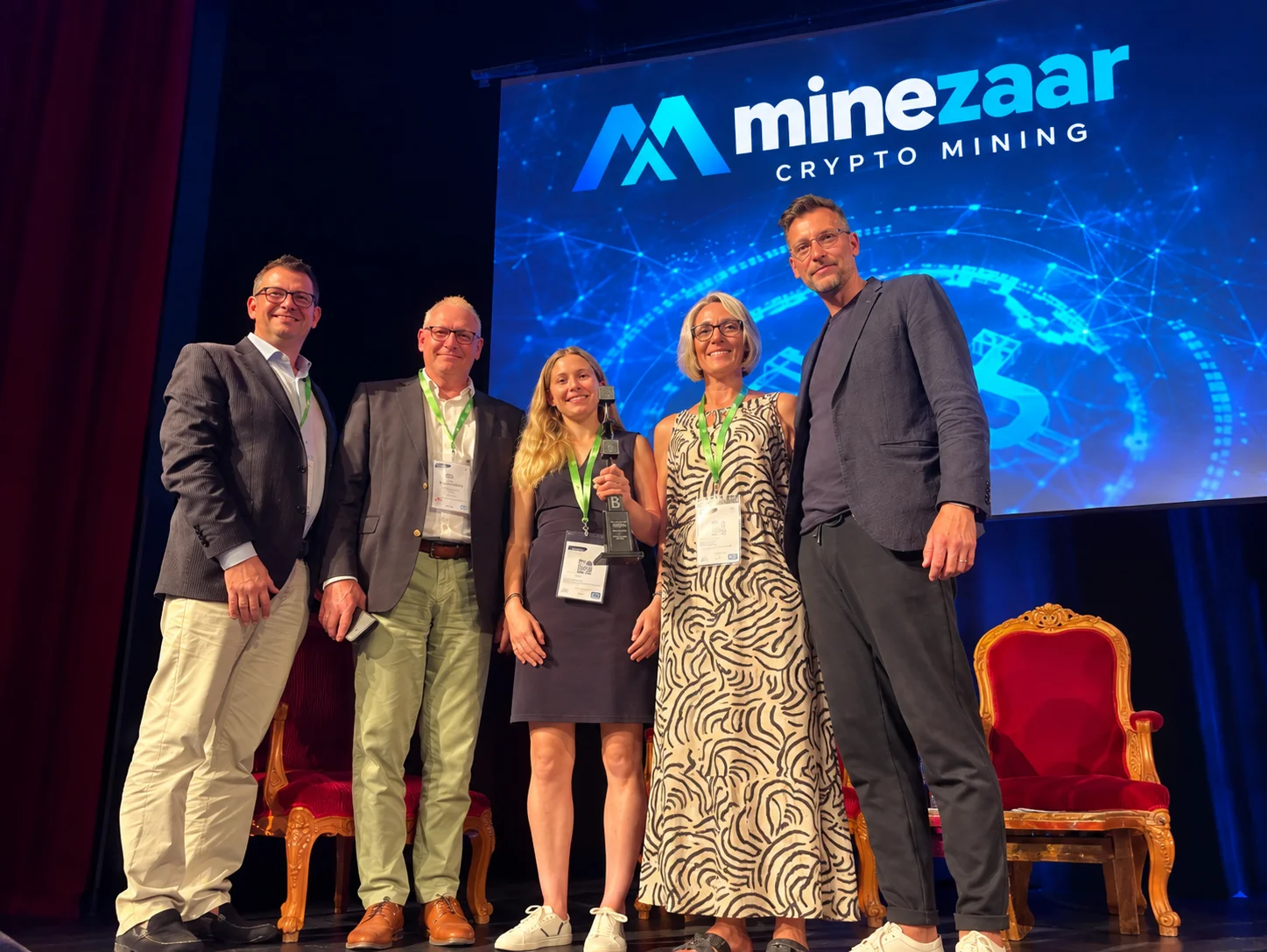 The Minezaar team accepting second place on stage